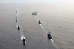 INDIAN OCEAN (April 16, 2012) The Nimitz-class aircraft carrier USS Carl Vinson (CVN 70), the Ticonderoga-class guided-missile cruiser USS Bunker Hill (CG 52) and the Arleigh Burke-class guided-missile destroyer USS Halsey (DDG 97) participate in a passing exercise with Indian navy ships during Exercise Malabar 2012. Carl Vinson, Bunker Hill, and Halsey comprise Carrier Strike Group (CSG) 1 and are participating in the annual bi-lateral naval field training exercise with the Indian navy to advance multinational maritime relationships and mutual security issues. (U.S. Navy photo by Mass Communication Specialist Seaman George M. Bell/Released) 120416-N-ZI635-151 