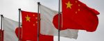 National flags of Japan and China (R) are displayed at Tokyo's Haneda Airport on May 30, 2010. Chinese Premier Wen Jiabao is on a three-day visit to Japan to hold talks with his  Japanese counterpart Yukio Hatoyama and business leaders.  AFP PHOTO/Kazuhiro NOGI