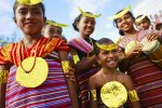 Timorese in traditional dress take part in a ceremony for the International Day of Peace, celebrated annually 21 September. The ceremony also marked the resumption of policing responsibilities in the district of Alieu by the Polícia Nacional de Timor-Leste (PNTL), which took over from UN Police forces.