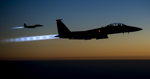 Two U.S. Air Force F-15E Strike Eagle aircraft fly over northern Iraq Sept. 23, 2014, after conducting airstrikes in Syria. Image credit: Flickr (US Department of Defence)