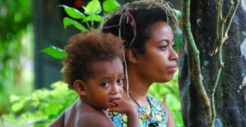 Mother and child in PNG. Image credit: Flickr (Austronesian Expeditions) Creative Commons.