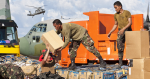 Philippines military members load relief aid. Image credit: Flickr (Department of Foreign Affairs and Trade) Creative Commons.