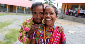 Fidelia Soares and her 12 year old daughter Domingas are involved in CARE's Young Women Young Nation education project in Liquica, Timor-Leste. The project encourages parents to send their girls to school and supports girls to stay there. Image credit: Flickr (Department of Foreign Affairs and Trade) Creative Commons.