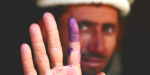 A man votes in Afghanistan  - Democracy is in retreat around the world. Photo Credit: Flickr (US Army Garrison - Miami) Creative Commons.