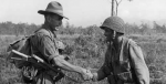 Australian Digger and American Paratrooper meet in 1943. The alliance between Australian and America has long been defined by the friendship from the Second World War. Photo Credit: Flickr (State Library Victoria Collections) Creative Commons.