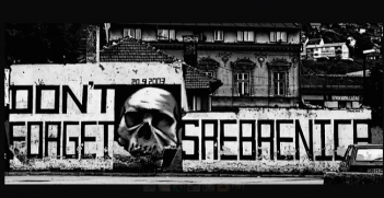 A photo taken Srebrenica of graffiti reminding people not to forget the massacre. Photo Credit: Flickr (Never-ending September) Creative Commons.