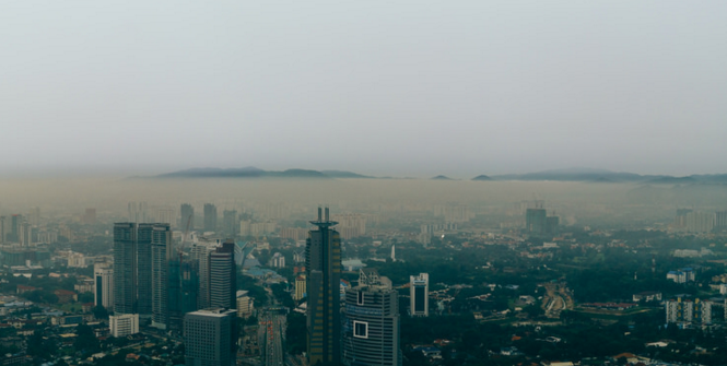 Beautiful and strange, haze chokes the city. Photo Source: Flickr (Naz Amir) Creative Commons