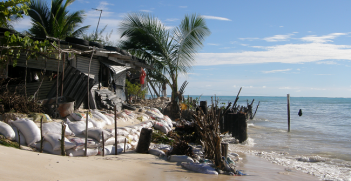 Households on South Tarawa do not have the option to retreat from coastal erosion, as the atoll is narrow and already crowded. Photo Source: Wikipedia (South Tarawa) Creative Commons