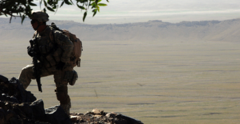 A U.S. Army Soldier from 2nd Battalion, 508th Parachute Infantry Regiment searches the mountains of the Andar province of Afghanistan for Taliban members and weapons caches June 6, 2007. Photo Source: (Flickr) The U.S. Army. Creative Commons.