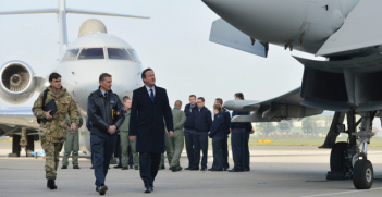 David Cameron looks at Typhoon during visit to RAF Northolt. Photo Source: (Flickr) Number 10. Creative Commons