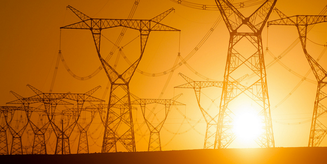 A network of electricity pylons north of Turpan in central Xinjiang as seen along the Lanzhou-Xinjiang Railway. Photo Source: hugociss (Flickr) Creative Commons