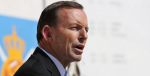 Australian Prime Minister Tony Abbott addresses the crowd at Multi-National Base Tarin Kot on Oct. 28, 2013 in Uruzgan, Afghanistan. Photo Source: US Embassy Kabul Afghanistan (Flickr). Creative Commons.