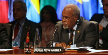 Papua New Guinea PM Sir Michael Somare follows proceedings at CHOGM 2009. Photo Source: The Commonwealth (Flickr). Creative Commons.