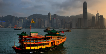 Wide view of Central Hong Kong from Kowloon's Avenue of Stars at dusk. Photo Source: Ed Coyle (Flickr). Creative Commons.