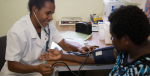 Rose in the treatment room at Susa Mama health clinic, Port Moresby General Hospital, PNG. Photo Source: DFAT (Flickr). Creative Commons.