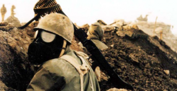 An Iranian soldier wearing a gas mask during the Iran-Iraq War. Wikimedia Commons.