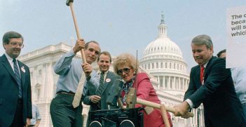 US representatives smash a Toshiba product. Source: Kinja image, Gizmodo