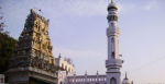 A Hindu temple stands next to a mosque in a neighbourhood in Bangladore. Indian tradition has long been influenced by the co-mingling of religious sources. Source: Mark Pritchard on Flickr.