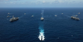 Naval ships in formation, including Indian and Australian vessels. Source: Wikimedia Commons http://bit.ly/2JOw8EO