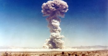 Military personnel observe a nuclear weapons test in Nevada, Source: International Campaign to Abolish Nuclear Weapons, Flickr, https://bit.ly/2ZfaNcp