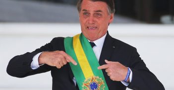 Brazil's President Jair Bolsonaro gestures after receiving the presidential sash, Source: Sergio Moraes, Flickr, https://bit.ly/2kv1Ih0