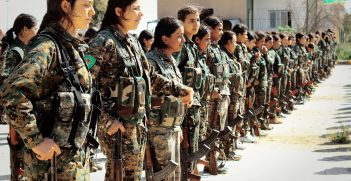 Kurdish YPG Fighters Stand in Line. Photo by Uzi Doeslt, Flickr.