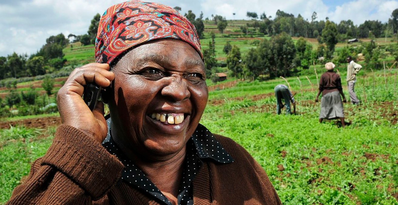 A woman in Kenya on her mobile phone. Photo: Wikimedia Commons - Neil Palmer