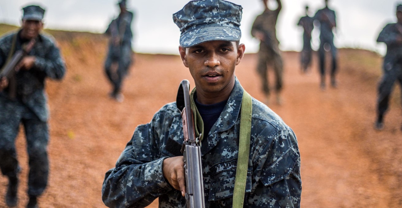 A Sri Lankan Marine takes point of his squad during the patrolling portion of a military tactics training and exchange, part of a theater security cooperation engagement at Welissara Naval Base, Sri Lanka, March 29, 2017. Photo by Cpl. Devan K. Gowans, US Marine Corps. Source: https://bit.ly/2OMNKlW
