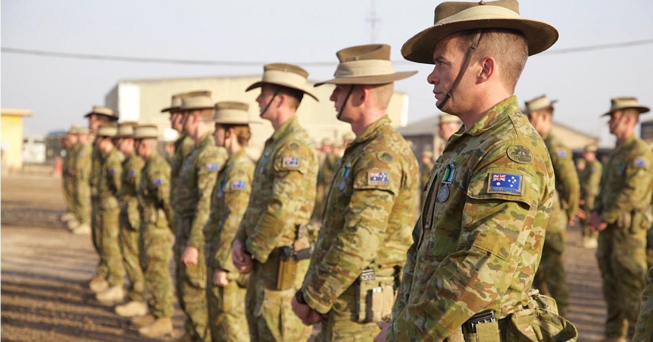  Australian soldiers, deployed in support of Combined Joint Task Force – Operation Inherent Resolve, attend a medals parade at Camp Taji, Iraq, Nov. 15, 2017. Photo by Rachel Diehm, US Army Photo. Source: 