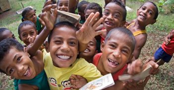 A group of school children at a village school in Vanua Levu, Fiji. Photo by Marc Anderson.