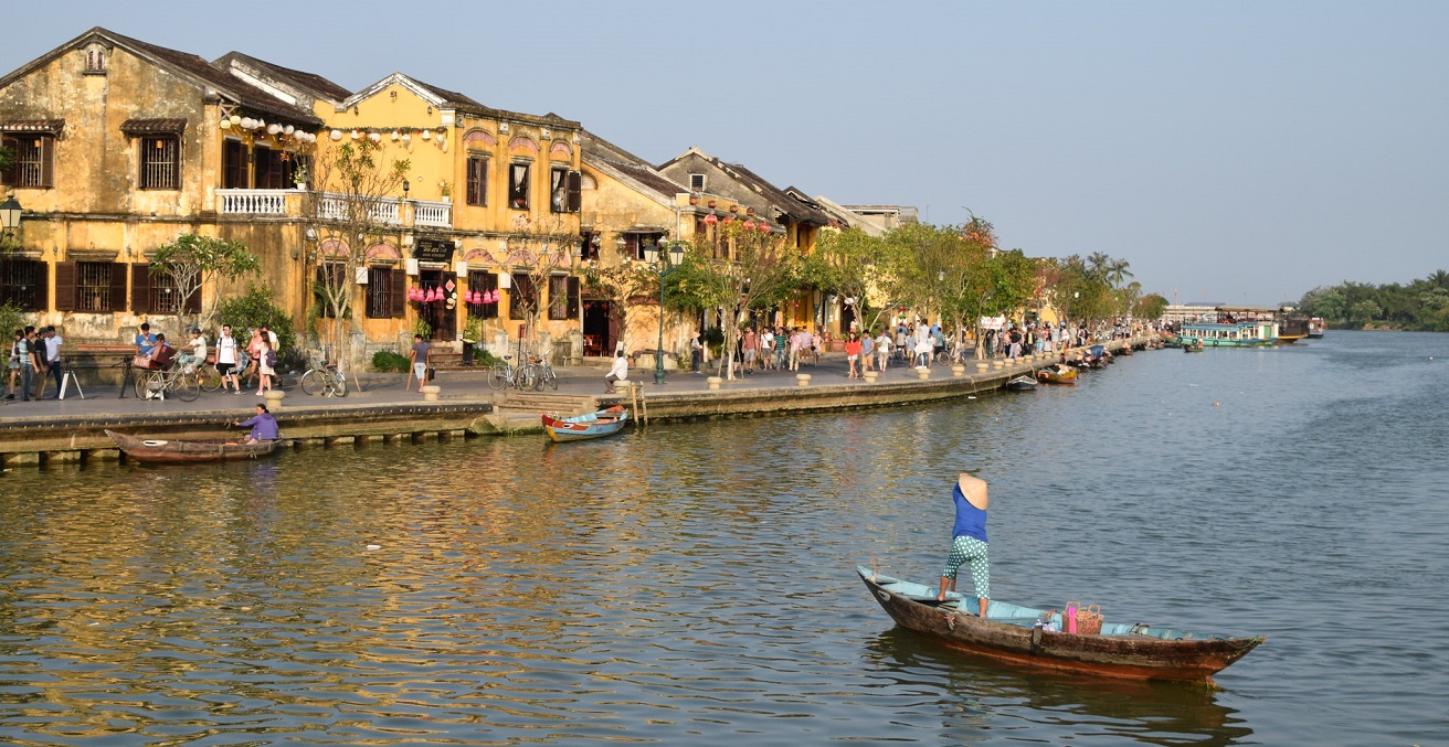 Riverside view of Hoi An, Vietnam.  Usually the waterfront is full of tourists exploring the UNESCO-listed town. Source: Paul Mannix https://bit.ly/2VlkUwg