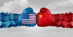 Boxing gloves depicting a clash between the US and China. Source: Lightspring https://shutr.bz/3iij3lR