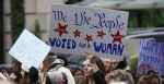 Hundreds of activists gathered in front of Trump International in Columbus Circle for a 