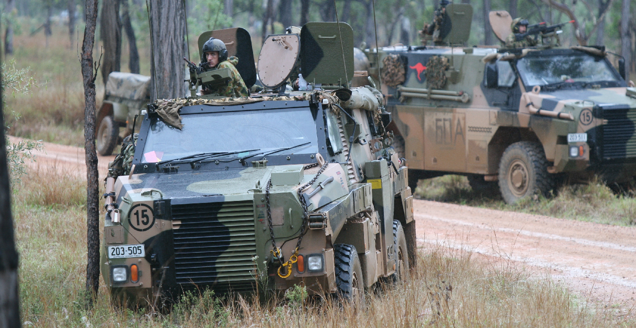 Two Bushmasters operated by the 2nd Battalion, Royal Australian Regiment during an exercise. Source: Wikimedia Commons https://bit.ly/3p1ab73